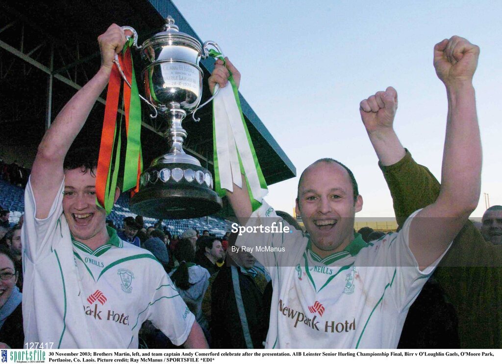 30 November 2003; Brothers Martin, left, and team captain Andy Comerford celebrate after the presentation. AIB Leinster Senior Hurling Championship Final, Birr v O'Loughlin Gaels, O'Moore Park, Portlaoise, Co. Laois. Picture credit; Ray McManus / SPORTSFILE *EDI*