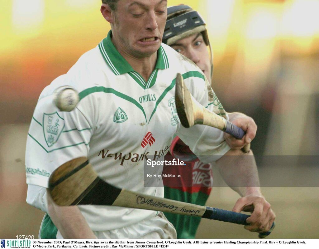 30 November 2003; Paul O'Meara, Birr, tips away the sliothar from Jimmy Comerford, O'Loughlin Gaels. AIB Leinster Senior Hurling Championship Final, Birr v O'Loughlin Gaels, O'Moore Park, Portlaoise, Co. Laois. Picture credit; Ray McManus / SPORTSFILE *EDI*