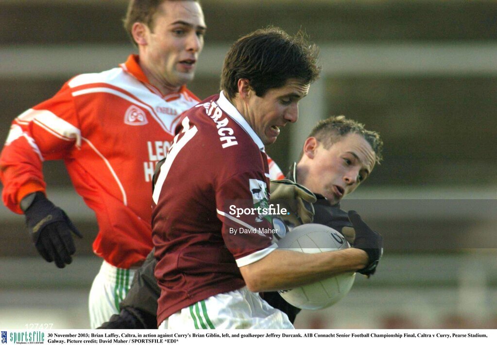 30 November 2003; Brian Laffey, Caltra, in action against Curry's Brian Giblin, left, and goalkeeper Jeffrey Durcank. AIB Connacht Senior Football Championship Final, Caltra v Curry, Pearse Stadium, Galway. Picture credit; David Maher / SPORTSFILE *EDI*