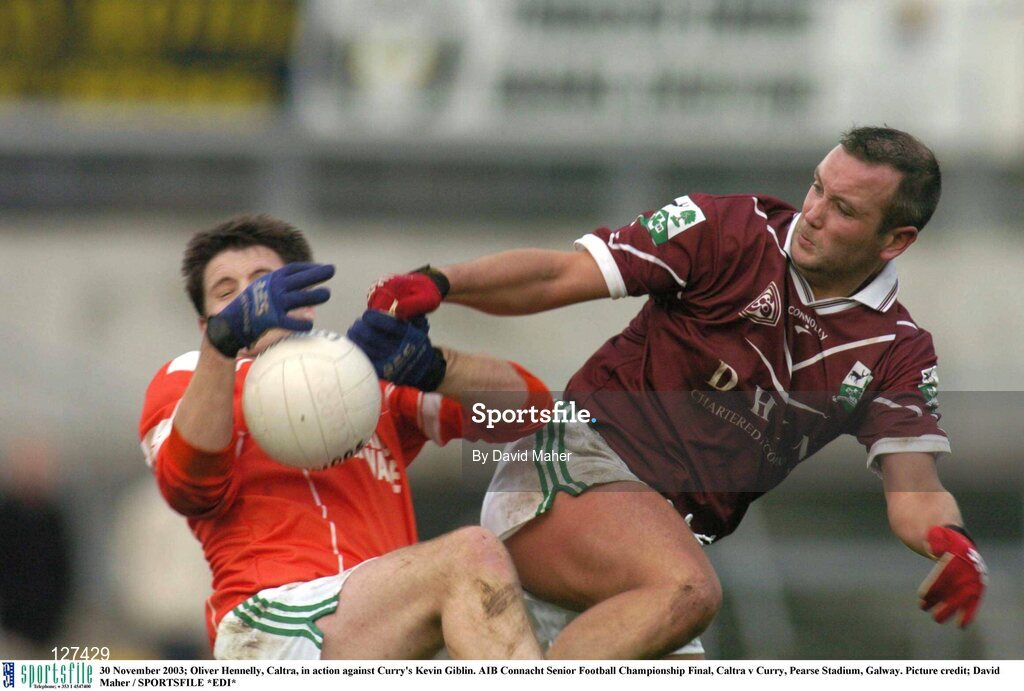 30 November 2003; Oliver Hennelly, Caltra, in action against Curry's Kevin Giblin. AIB Connacht Senior Football Championship Final, Caltra v Curry, Pearse Stadium, Galway. Picture credit; David Maher / SPORTSFILE *EDI*