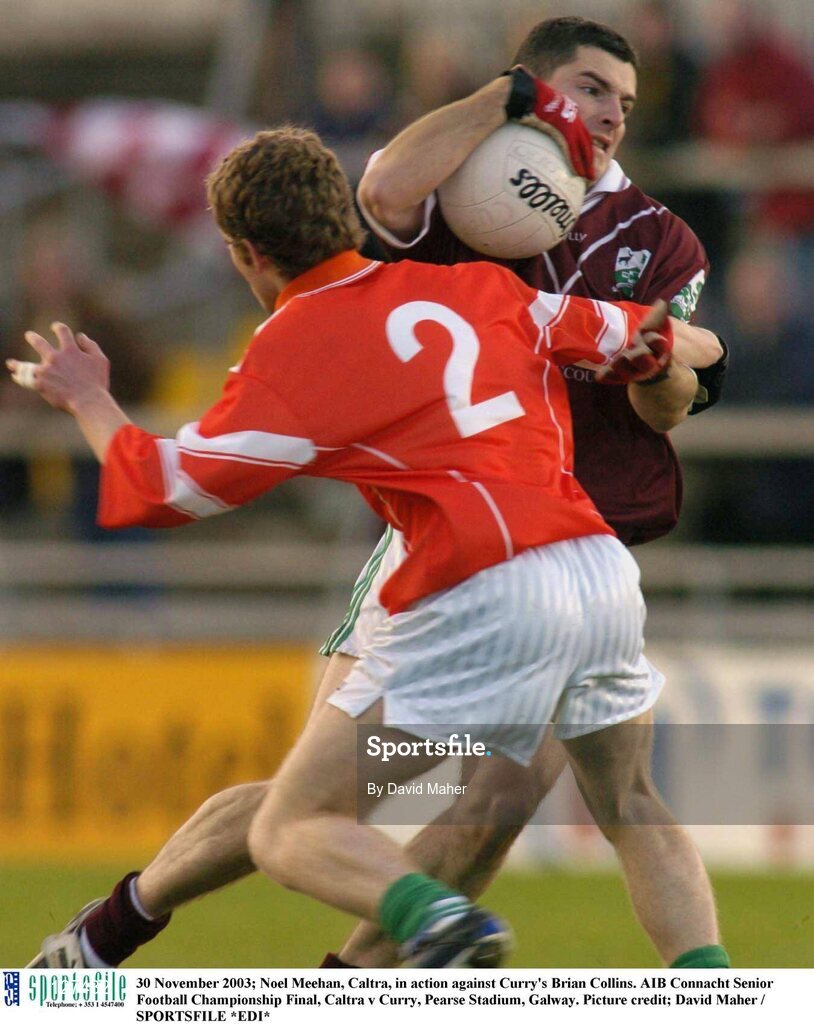 30 November 2003; Noel Meehan, Caltra, in action against Curry's Brian Collins. AIB Connacht Senior Football Championship Final, Caltra v Curry, Pearse Stadium, Galway. Picture credit; David Maher / SPORTSFILE *EDI*