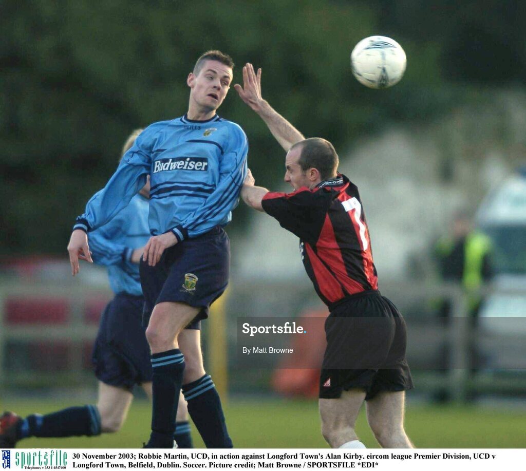 30 November 2003; Robbie Martin, UCD, in action against Longford Town's Alan Kirby. eircom league Premier Division, UCD v Longford Town, Belfield, Dublin. Soccer. Picture credit; Matt Browne / SPORTSFILE *EDI*