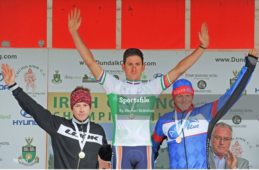 23 June 2013: Philip Lavery, Amicale Cycliste Bisontine, left, second place, celebrates with race winner Matt Brammeier, centre, Champion Systems Pro Cycling Team, and third place Damien Shaw, on the awards podium at the Elite Men's Road Race National Championships. National Road Race Championships, Carlingford, Co. Louth. Picture credit: Stephen McMahon / SPORTSFILE