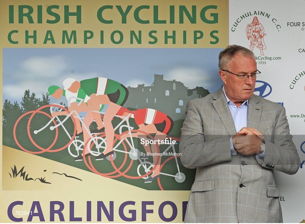 23 June 2013; Pat McQuaid, President of the Union Cycliste Internationale (UCI), on the awards podium at the Elite Men's National Road Race Championships. 2013 National Road Race Championships, Carlingford, Co. Louth. Picture credit: Stephen McMahon / SPORTSFILE