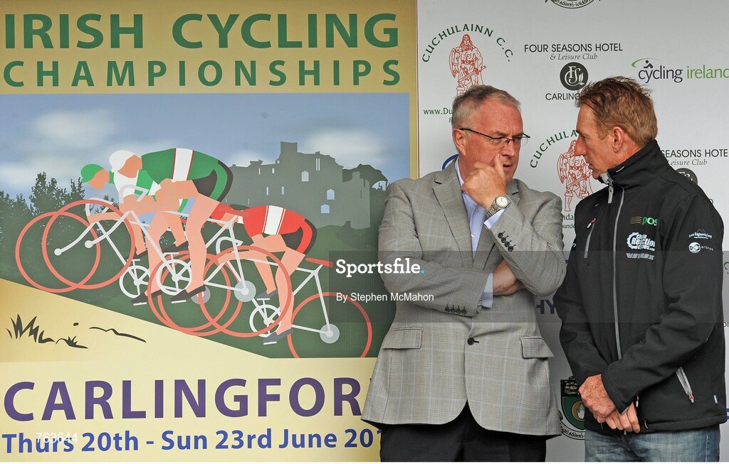 23 June 2013; Pat McQuaid, left, President of the Union Cycliste Internationale (UCI), left, with Sean Kelly on the awards podium at the Elite Men's National Road Race Championships. 2013 National Road Race Championships, Carlingford, Co. Louth. Picture credit: Stephen McMahon / SPORTSFIL