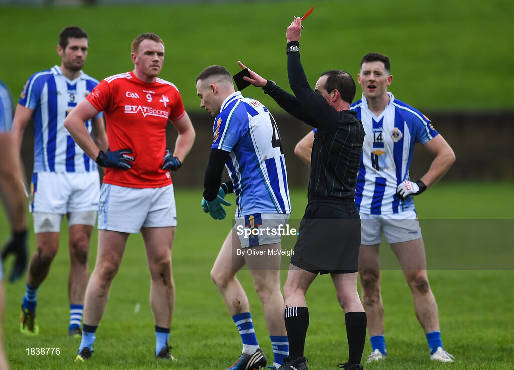 10 November 2019; Referee David Coldrick issues a red card to Cathal Flaherty of Ballyboden St Enda's after a first-half incident during the AIB Leinster GAA Football Senior Club Championship Quarter-Final match between Newtown Blues and Ballyboden St Enda's at the Gaelic Grounds in Drogheda, Co Louth. Photo by Oliver McVeigh/Sportsfile
