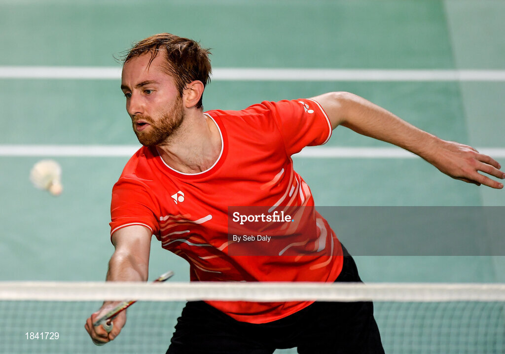 15 November 2019; Sam Magee of Ireland in action against Mathias Thyrri and Mai Surrow of Denmark during his mixed doubles quarter-final match of the AIG FZ Forza Irish Open Badminton Championships at the National Indoor Arena in Abbotstown, Dublin. Photo by Seb Daly/Sportsfile