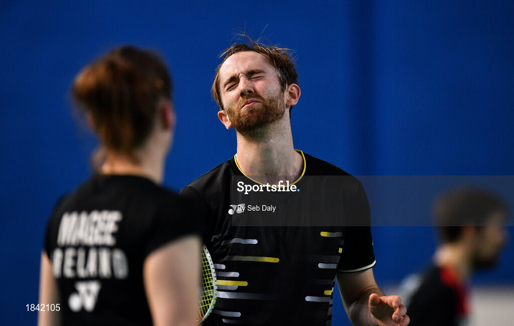 15 November 2019; Sam Magee of Ireland reacts after losing a point during his mixed doubles semi-final match against Anne Tran and Ronan Labar of France at the AIG FZ Forza Irish Open Badminton Championships at the National Indoor Arena in Abbotstown, Dublin. Photo by Seb Daly/Sportsfile