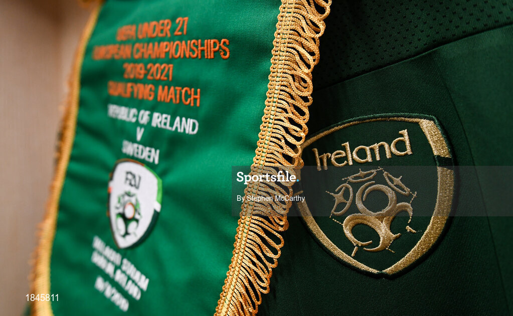 19 November 2019; The match pennant hangs in front of the jersey assigned to Republic of Ireland captain Jayson Molumby in their dressing room prior to the UEFA European U21 Championship Qualifier match between Republic of Ireland and Sweden at Tallaght Stadium in Tallaght, Dublin. Photo by Stephen McCarthy/Sportsfile