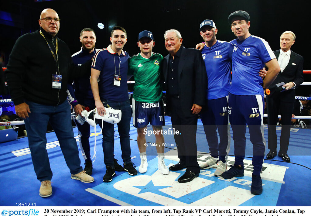 30 November 2019; Carl Frampton with his team, from left, Top Rank VP Carl Moretti, Tommy Coyle, Jamie Conlan, Top RanK CEO Bob Arum, and his trainers Jamie Moore and Nigel Travis after defeating Tyler McCreary in their super-featherweight bout at the Cosmopolitan of Las Vegas in Las Vegas, Nevada, United States. Photo by Mikey Williams/Top Rank/Sportsfile
