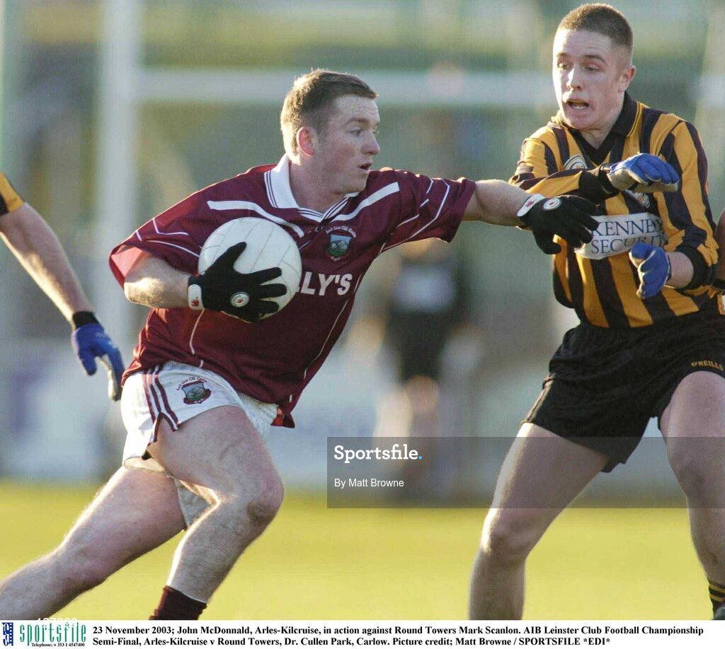 23 November 2003; John McDonnald, Arles-Kilcruise, in action against Round Towers Mark Scanlon. AIB Leinster Club Football Championship Semi-Final, Arles-Kilcruise v Round Towers, Dr. Cullen Park, Carlow. Picture credit; Matt Browne / SPORTSFILE *EDI*