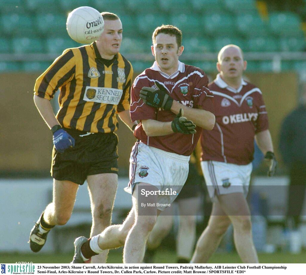 23 November 2003; Shane Carroll, Arles/Kilcruise, in action against Round Towers, Padraig Mullarkey. AIB Leinster Club Football Championship Semi-Final, Arles-Kilcruise v Round Towers, Dr. Cullen Park, Carlow. Picture credit; Matt Browne / SPORTSFILE *EDI*