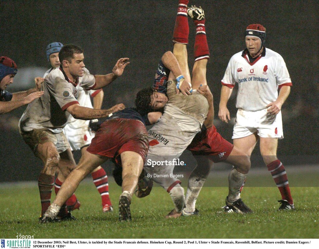 12 December 2003; Neil Best, Ulster, is tackled by the Stade Francais defence. Heineken Cup, Round 2, Pool 1, Ulster v Stade Francais, Ravenhill, Belfast. Picture credit; Damien Eagers / SPORTSFILE *EDI*