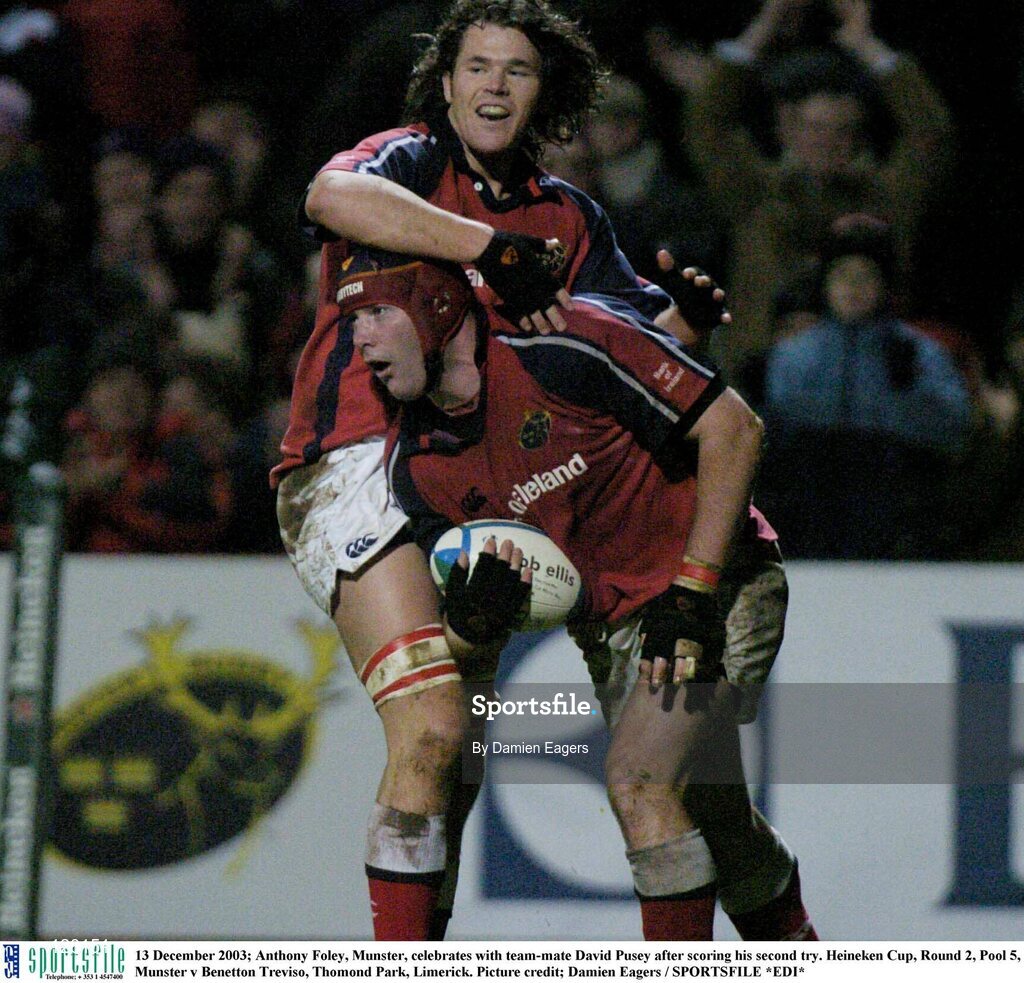 13 December 2003; Anthony Foley, Munster, celebrates with team-mate David Pusey after scoring his second try. Heineken Cup, Round 2, Pool 5, Munster v Benetton Treviso, Thomond Park, Limerick. Picture credit; Damien Eagers / SPORTSFILE *EDI*