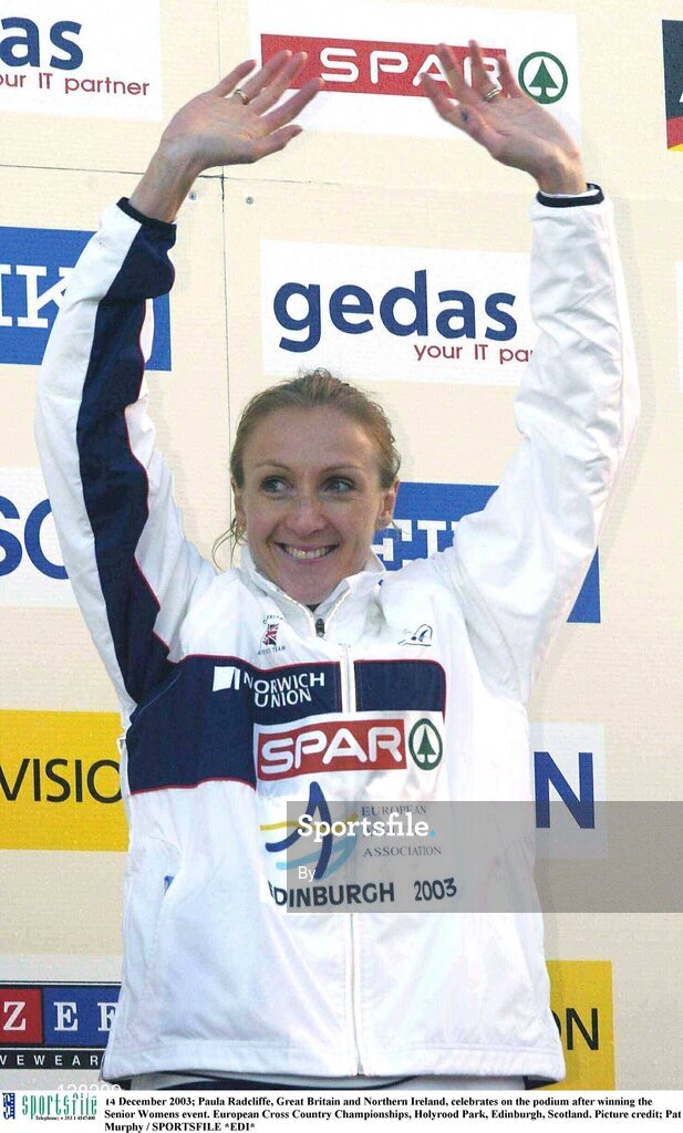 14 December 2003; Paula Radcliffe, Great Britain and Northern Ireland, celebrates on the podium after winning the Senior Womens event. European Cross Country Championships, Holyrood Park, Edinburgh, Scotland. Picture credit; Pat Murphy / SPORTSFILE *EDI*
