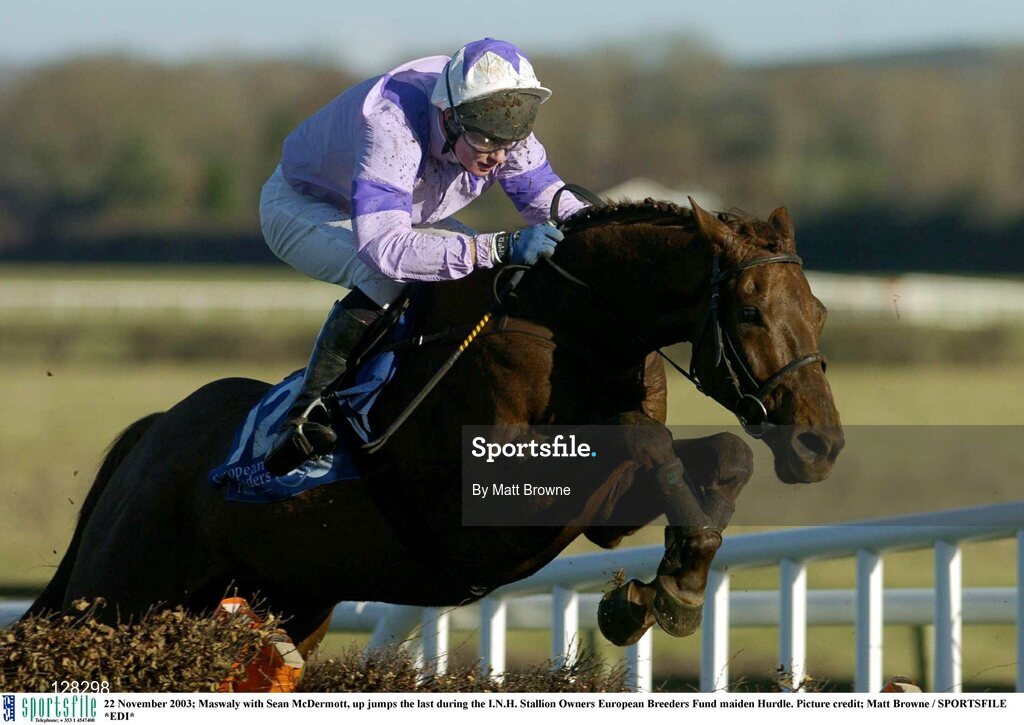 22 November 2003; Maswaly with Sean McDermott, up jumps the last during the I.N.H. Stallion Owners European Breeders Fund maiden Hurdle. Picture credit; Matt Browne / SPORTSFILE *EDI*