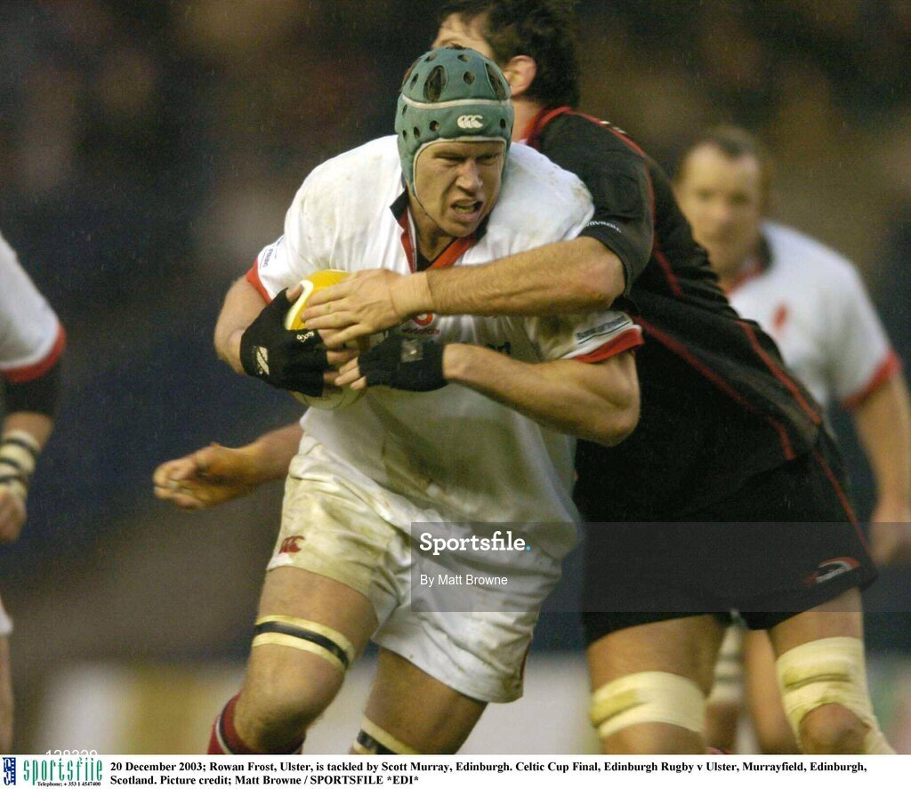 20 December 2003; Rowan Frost, Ulster, is tackled by Scott Murray, Edinburgh. Celtic Cup Final, Edinburgh Rugby v Ulster, Murrayfield, Edinburgh, Scotland. Picture credit; Matt Browne / SPORTSFILE *EDI*
