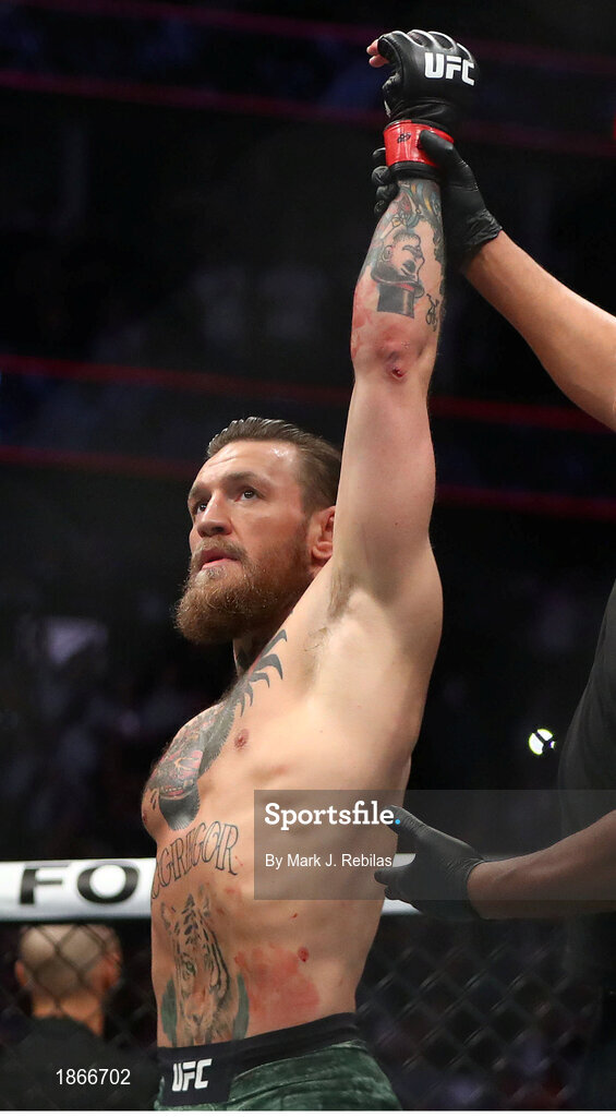 18 January 2020; Conor McGregor has his hand raised following his UFC 246 Welterweight bout with Donald Cerrone at the T-Mobile Arena in Las Vegas, Nevada, USA. Photo by Mark J. Rebilas / USA TODAY Sports via Sportsfile