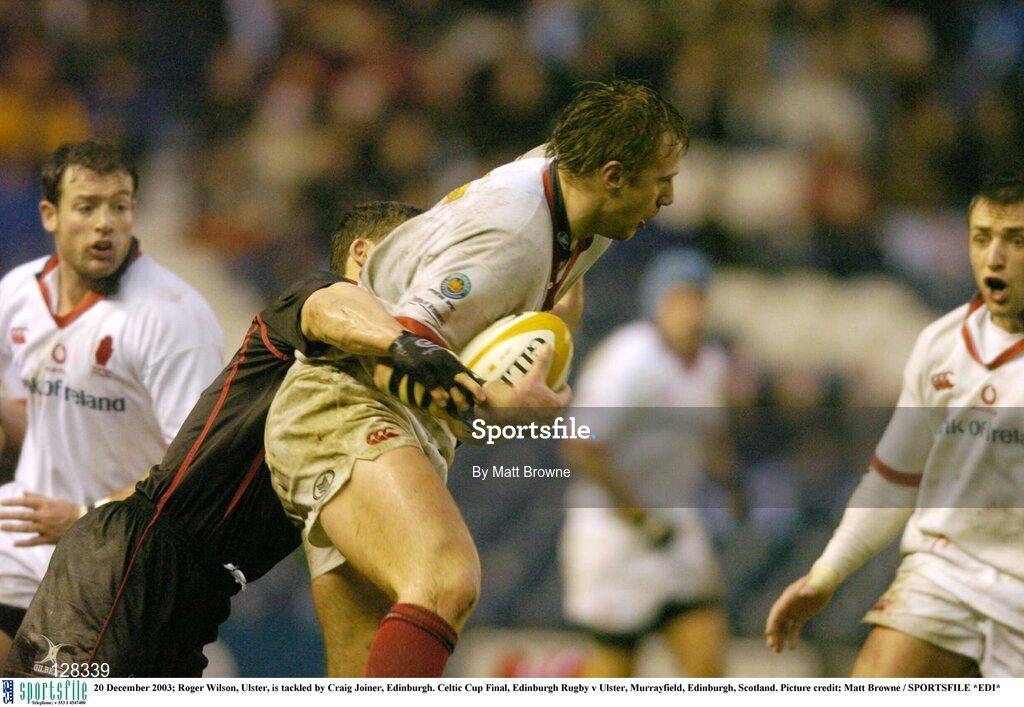 20 December 2003; Roger Wilson, Ulster, is tackled by Craig Joiner, Edinburgh. Celtic Cup Final, Edinburgh Rugby v Ulster, Murrayfield, Edinburgh, Scotland. Picture credit; Matt Browne / SPORTSFILE *EDI*