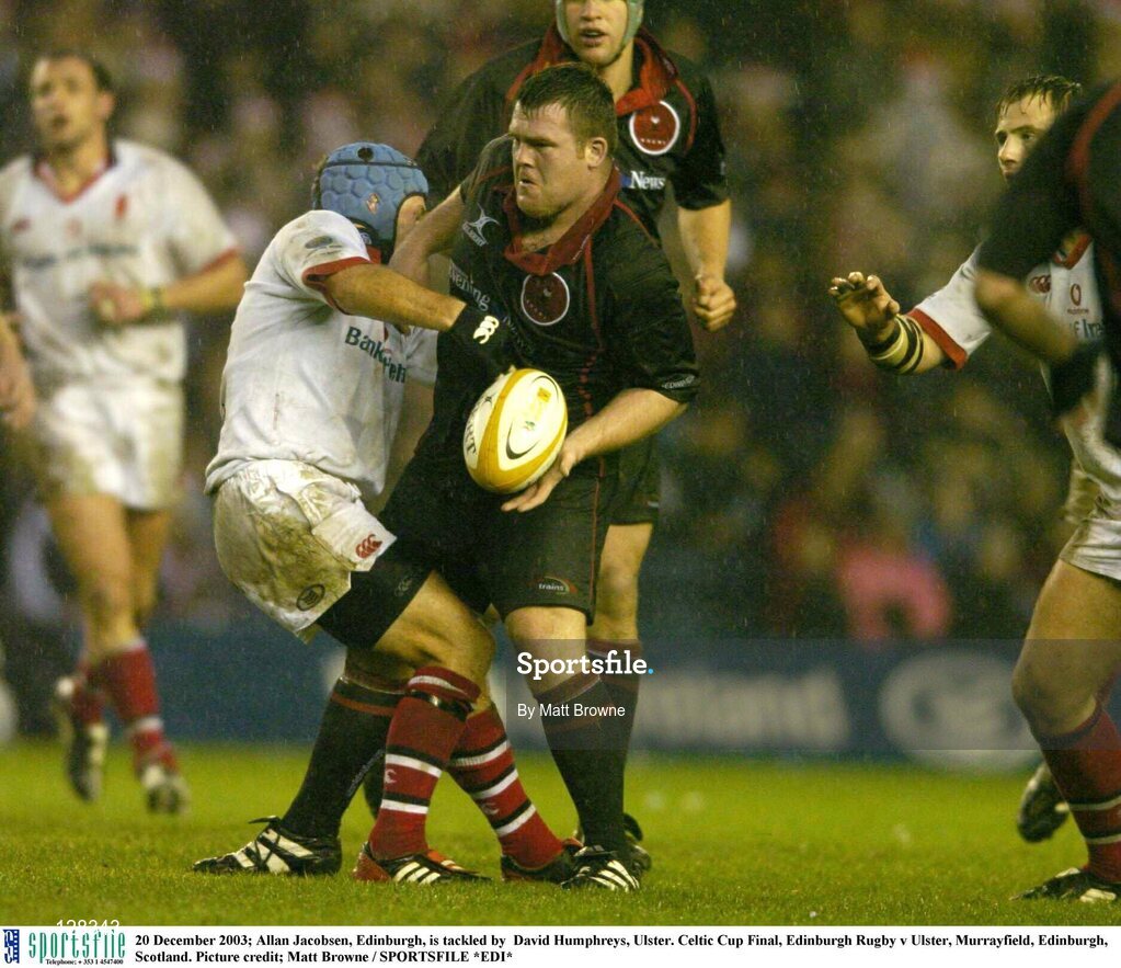 20 December 2003; Allan Jacobsen, Edinburgh, is tackled by  David Humphreys, Ulster. Celtic Cup Final, Edinburgh Rugby v Ulster, Murrayfield, Edinburgh, Scotland. Picture credit; Matt Browne / SPORTSFILE *EDI*