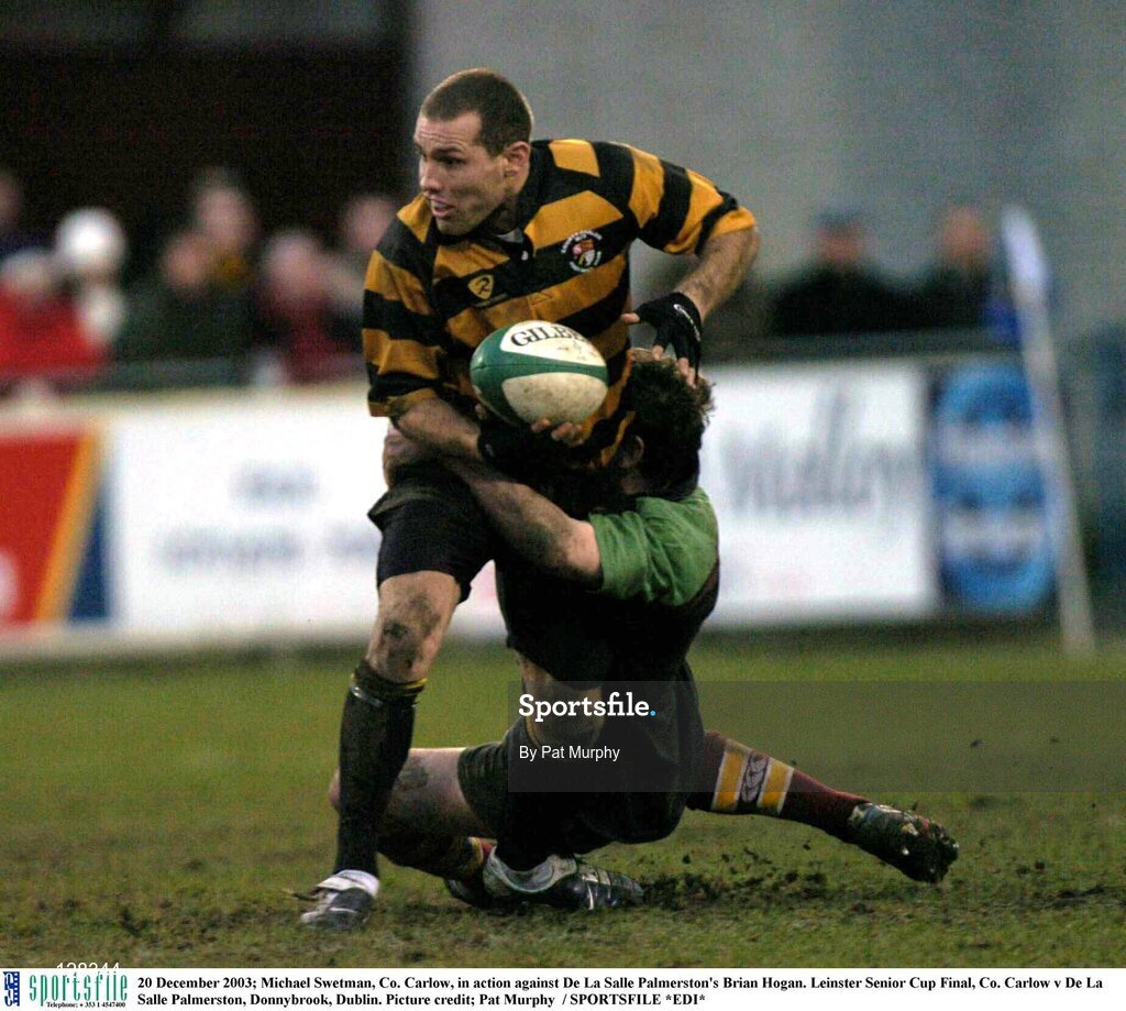 20 December 2003; Thomas Bonnefoy, Co. Carlow, in action against De La Salle Palmerston's Brian Hogan. Leinster Senior Cup Final, Co. Carlow v De La Salle Palmerston, Donnybrook, Dublin. Picture credit; Pat Murphy  / SPORTSFILE *EDI*