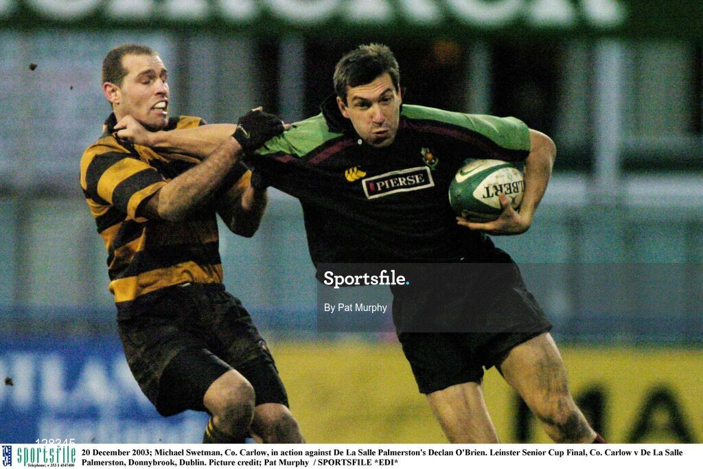 20 December 2003; Thomas Bonnefoy, Co. Carlow, in action against De La Salle Palmerston's Declan O'Brien. Leinster Senior Cup Final, Co. Carlow v De La Salle Palmerston, Donnybrook, Dublin. Picture credit; Pat Murphy  / SPORTSFILE *EDI*