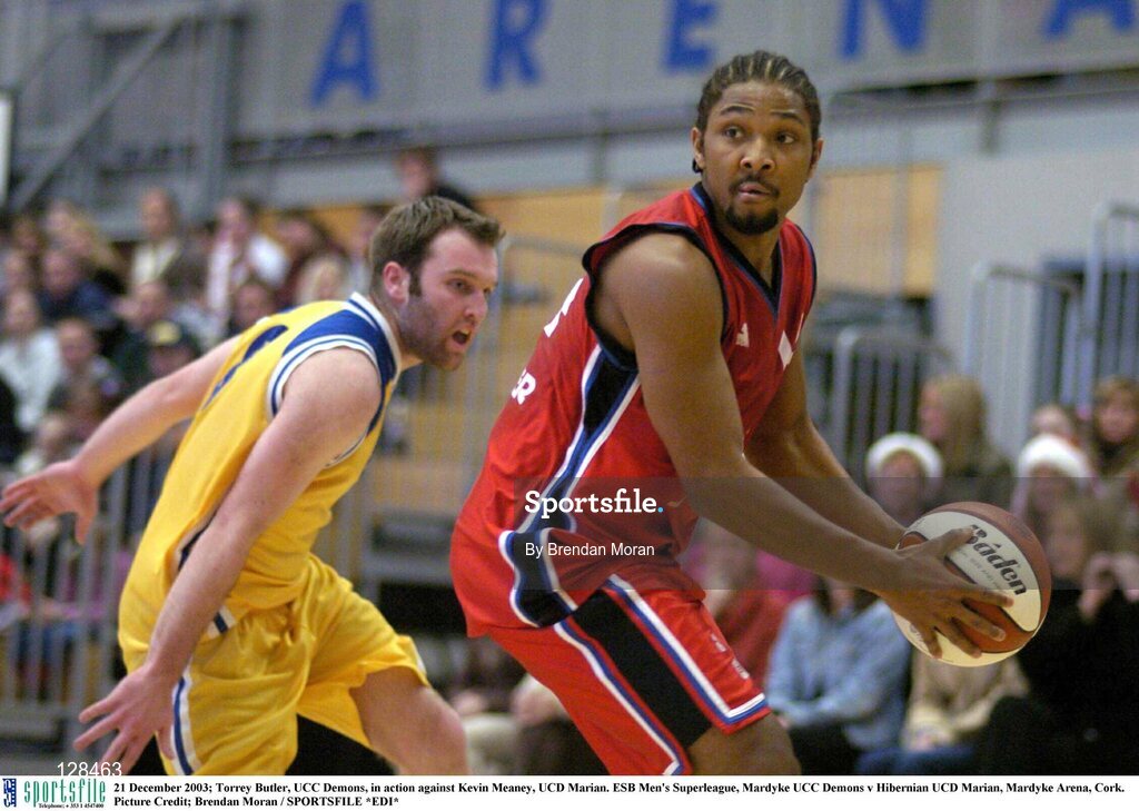 21 December 2003; Torrey Butler, UCC Demons, in action against Kevin Meaney, UCD Marian. ESB Men's Superleague, Mardyke UCC Demons v Hibernian UCD Marian, Mardyke Arena, Cork. Picture Credit; Brendan Moran / SPORTSFILE *EDI*