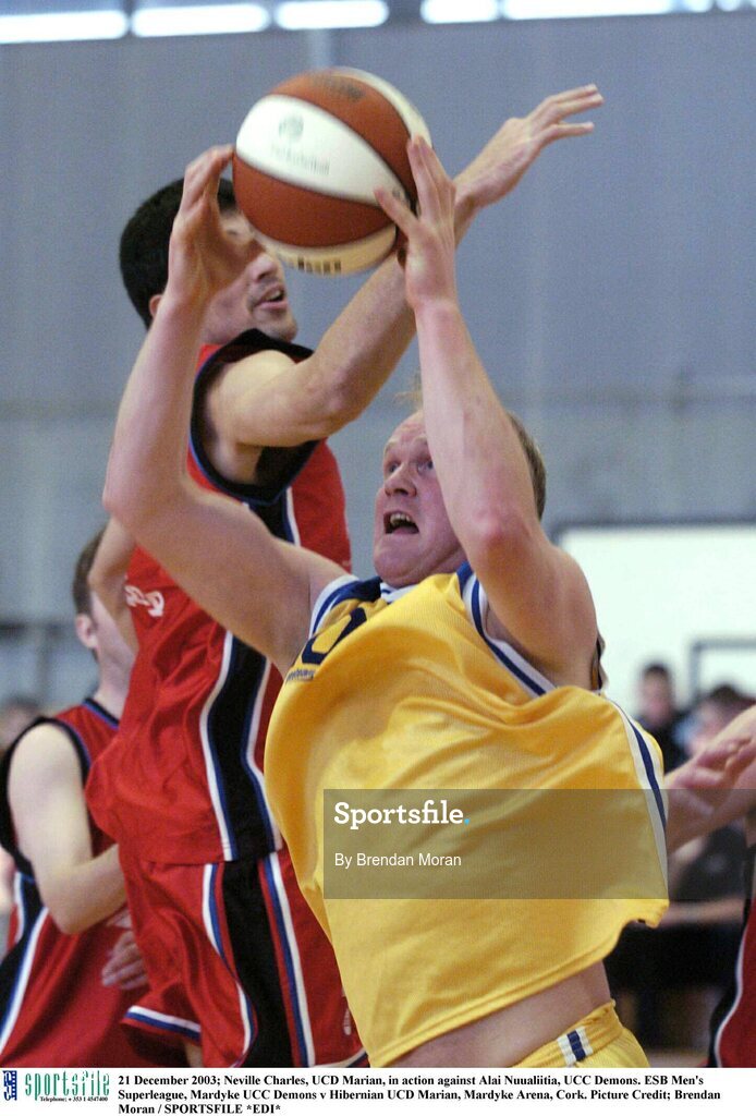 21 December 2003; Neville Charles, UCD Marian, in action against Alai Nuualiitia, UCC Demons. ESB Men's Superleague, Mardyke UCC Demons v Hibernian UCD Marian, Mardyke Arena, Cork. Picture Credit; Brendan Moran / SPORTSFILE *EDI*