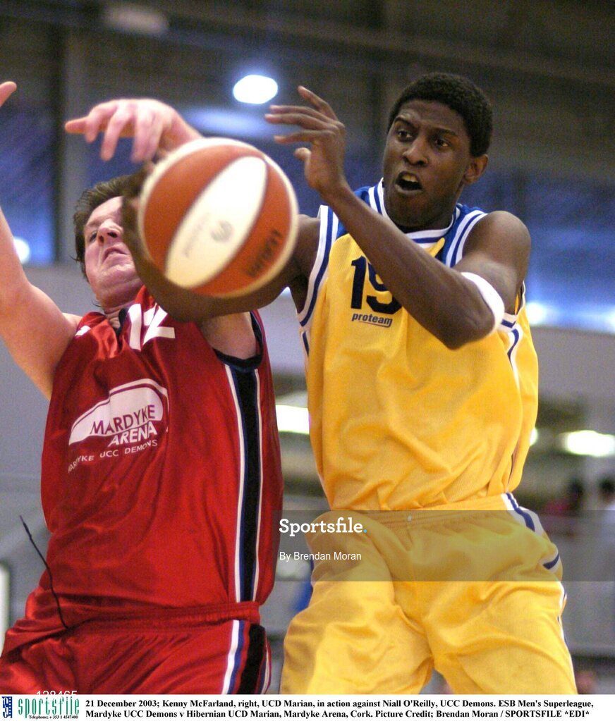 21 December 2003; Kenny McFarland, right, UCD Marian, in action against Niall O'Reilly, UCC Demons. ESB Men's Superleague, Mardyke UCC Demons v Hibernian UCD Marian, Mardyke Arena, Cork. Picture Credit; Brendan Moran / SPORTSFILE *EDI*