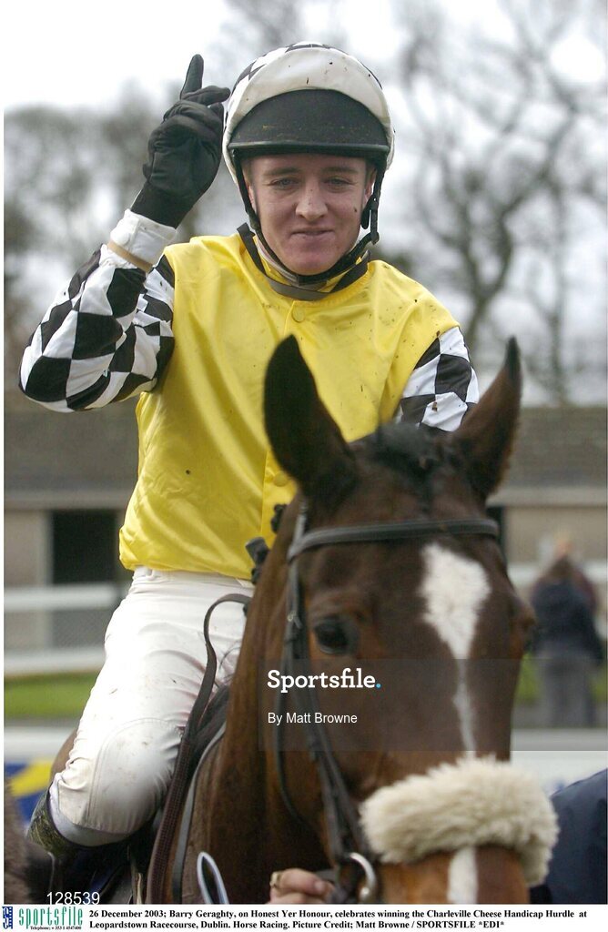 26 December 2003; Barry Geraghty, on Honest Yer Honour, celebrates winning the Charleville Cheese Handicap Hurdle  at Leopardstown Racecourse, Dublin. Horse Racing. Picture Credit; Matt Browne / SPORTSFILE *EDI*