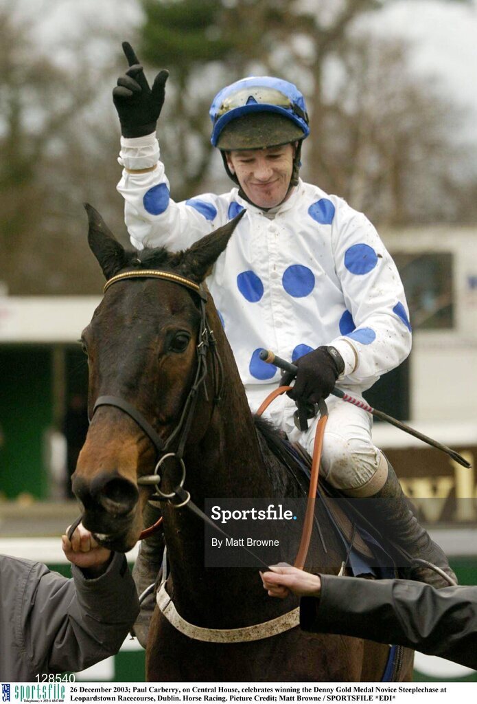 26 December 2003; Paul Carberry, on Central House, celebrates winning the Denny Gold Medal Novice Steeplechase at Leopardstown Racecourse, Dublin. Horse Racing. Picture Credit; Matt Browne / SPORTSFILE *EDI*