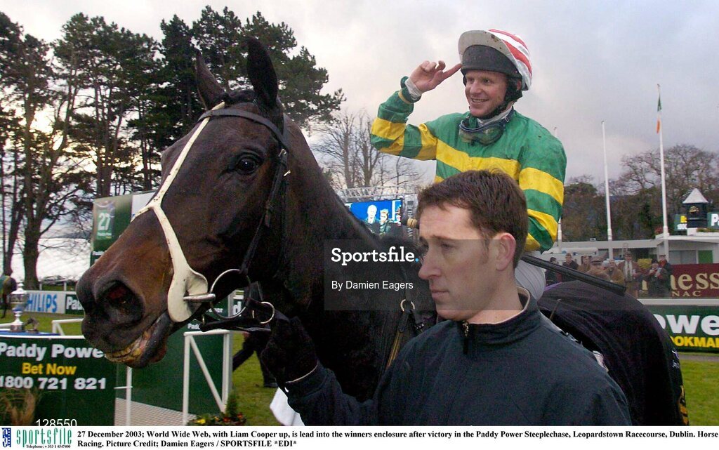 27 December 2003; World Wide Web, with Liam Cooper up, is lead into the winners enclosure after victory in the Paddy Power Steeplechase, Leopardstown Racecourse, Dublin. Horse Racing. Picture Credit; Damien Eagers / SPORTSFILE *EDI*