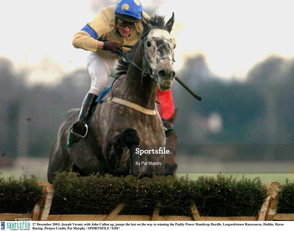27 December 2003; Joseph Vernet, with John Cullen up, jumps the last on the way to winning the Paddy Power Handicap Hurdle, Leopardstown Racecourse, Dublin. Horse Racing. Picture Credit; Pat Murphy / SPORTSFILE *EDI*