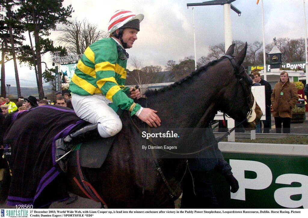 27 December 2003; World Wide Web, with Liam Cooper up, is lead into the winners enclosure after victory in the Paddy Power Steeplechase, Leopardstown Racecourse, Dublin. Horse Racing. Picture Credit; Damien Eagers / SPORTSFILE *EDI*