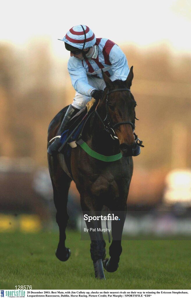 28 December 2003; Best Mate, with Jim Culloty up, checks on their nearest rivals on their way to winning the Ericsson Steeplechase, Leopardstown Racecourse, Dublin. Horse Racing. Picture Credit; Pat Murphy / SPORTSFILE *EDI*