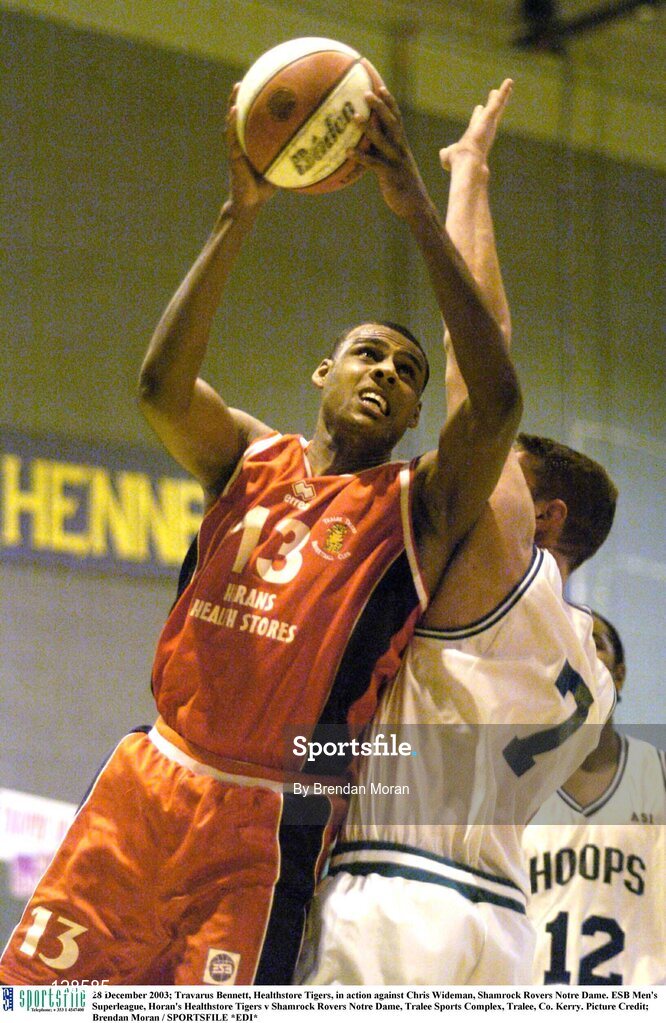 28 December 2003; Travarus Bennett, Healthstore Tigers, in action against Chris Wideman, Shamrock Rovers Notre Dame. ESB Men's Superleague, Horan's Healthstore Tigers v Shamrock Rovers Notre Dame, Tralee Sports Complex, Tralee, Co. Kerry. Picture Credit; Brendan Moran / SPORTSFILE *EDI*