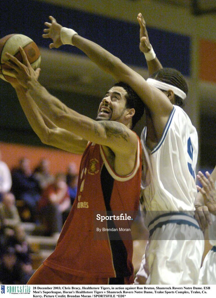 28 December 2003; Chris Bracy, Healthstore Tigers, in action against Ron Bruton, Shamrock Rovers Notre Dame. ESB Men's Superleague, Horan's Healthstore Tigers v Shamrock Rovers Notre Dame, Tralee Sports Complex, Tralee, Co. Kerry. Picture Credit; Brendan Moran / SPORTSFILE *EDI*