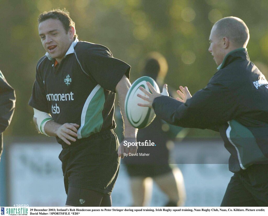 29 December 2003; Ireland's Rob Henderson passes to Peter Stringer during squad training. Irish Rugby squad training, Naas Rugby Club, Naas, Co. Kildare. Picture credit; David Maher / SPORTSFILE *EDI*