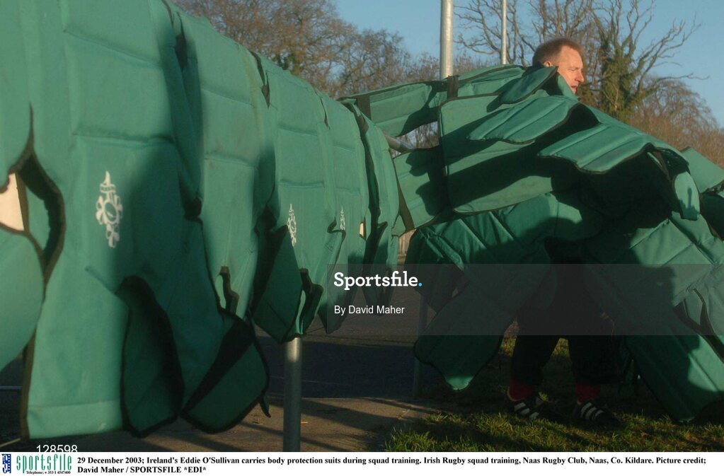 29 December 2003; Ireland's Eddie O'Sullivan carries body protection suits during squad training. Irish Rugby squad training, Naas Rugby Club, Naas, Co. Kildare. Picture credit; David Maher / SPORTSFILE *EDI*
