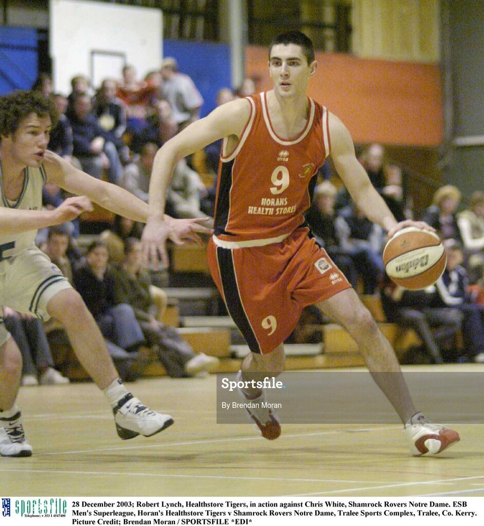 28 December 2003; Robert Lynch, Healthstore Tigers, in action against Chris White, Shamrock Rovers Notre Dame. ESB Men's Superleague, Horan's Healthstore Tigers v Shamrock Rovers Notre Dame, Tralee Sports Complex, Tralee, Co. Kerry. Picture Credit; Brendan Moran / SPORTSFILE *EDI*