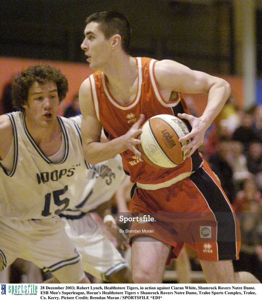 28 December 2003; Robert Lynch, Healthstore Tigers, in action against Ciaran White, Shamrock Rovers Notre Dame. ESB Men's Superleague, Horan's Healthstore Tigers v Shamrock Rovers Notre Dame, Tralee Sports Complex, Tralee, Co. Kerry. Picture Credit; Brendan Moran / SPORTSFILE *EDI*