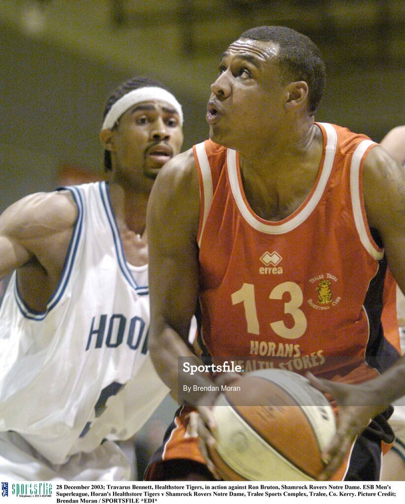 28 December 2003; Travarus Bennett, Healthstore Tigers, in action against Ron Bruton, Shamrock Rovers Notre Dame. ESB Men's Superleague, Horan's Healthstore Tigers v Shamrock Rovers Notre Dame, Tralee Sports Complex, Tralee, Co. Kerry. Picture Credit; Brendan Moran / SPORTSFILE *EDI*