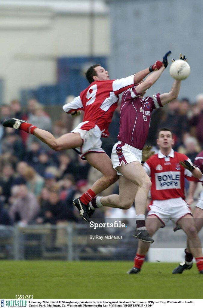 4 January 2004; David O'Shaughnessy, Westmeath, in action against Graham Carr, Louth. O'Byrne Cup, Westmeath v Louth, Cusack Park, Mullingar, Co. Westmeath. Picture credit; Ray McManus / SPORTSFILE *EDI*