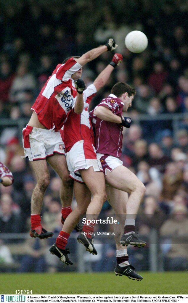 4 January 2004; David O'Shaughnessy, Westmeath, in action against Louth players David Devenney and Graham Carr. O'Byrne Cup, Westmeath v Louth, Cusack Park, Mullingar, Co. Westmeath. Picture credit; Ray McManus / SPORTSFILE *EDI*