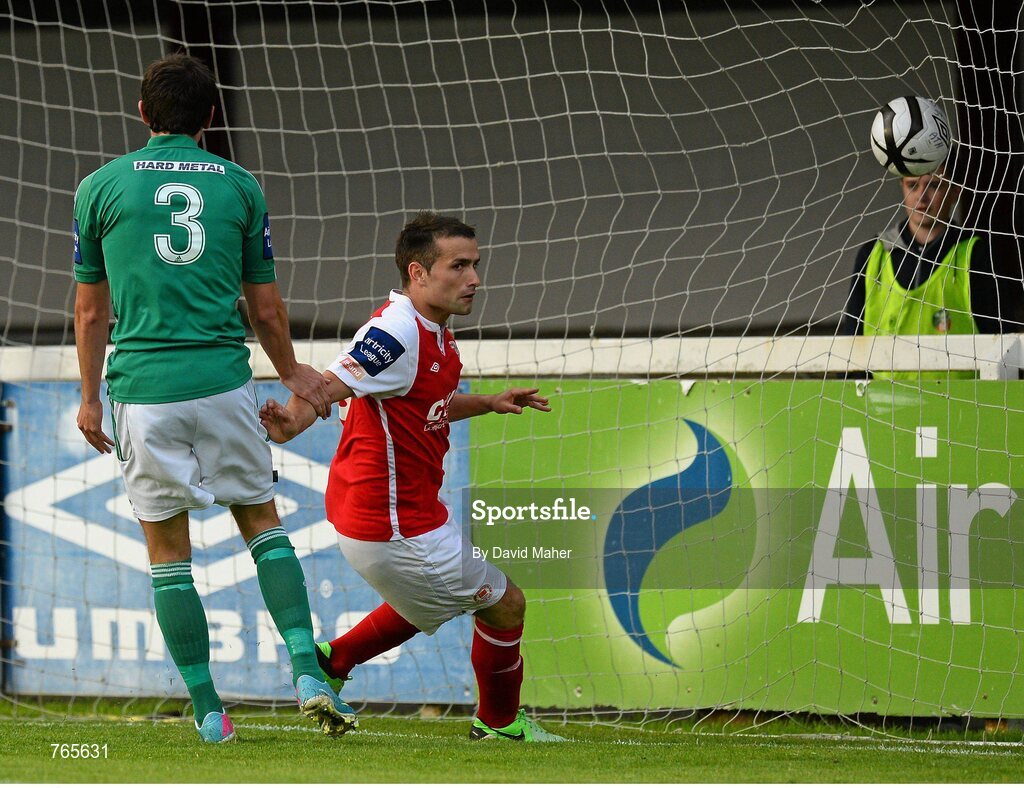 28 June 2013; St. Patrick’s Athletic's Christy Fagan scores his side's first goal despite the attempts of Bray Wanderers Kevin Knight. Airtricity League Premier Division, St. Patrick’s Athletic v Bray Wanderers, Richmond Park, Dublin. Picture credit: David Maher / SPORTSFILE