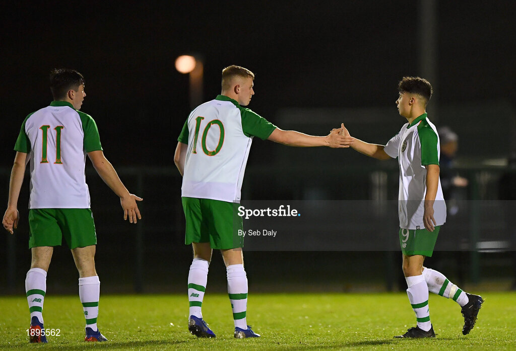 5 February 2019; Callum Ross Lynch of Republic of Ireland, right, is congratulated by team-mate Rowan Roache, centre, after scoring his side's first goal during the friendly match between Republic of Ireland U19 and Drogheda United at the FAI National Training Centre in Abbotstown, Dublin. Photo by Seb Daly/Sportsfile