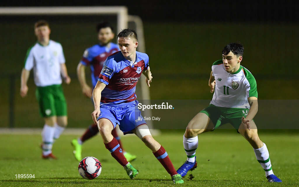 5 February 2019; Thomas Byrne of Drogheda United in action against Liam Kerrigan of Republic of Ireland during the friendly match between Republic of Ireland U19 and Drogheda United at the FAI National Training Centre in Abbotstown, Dublin. Photo by Seb Daly/Sportsfile