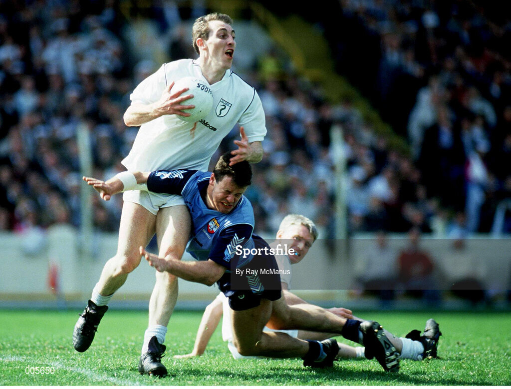 5 May 1991; Davy Dalton of Kildare in action against Vinny Murphy of Dublin during the Royal Liver National Football League Final match between Dublin and Kildare at Croke Park in Dublin. Photo by Ray McManus/Sportsfile