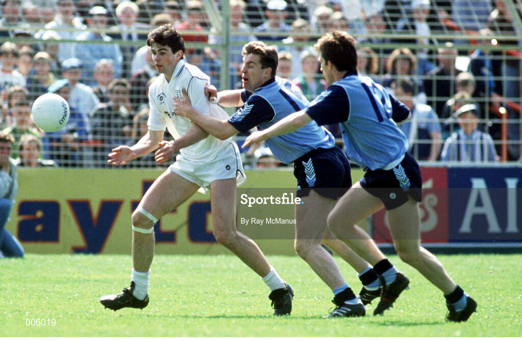 5 May 1991; Martin Lynch of Kildare in action against Paul Bealin, centre, and Niall Guiden of Dublin during the Royal Liver National Football League Final match between Dublin and Kildare at Croke Park in Dublin. Photo by Ray McManus/Sportsfile