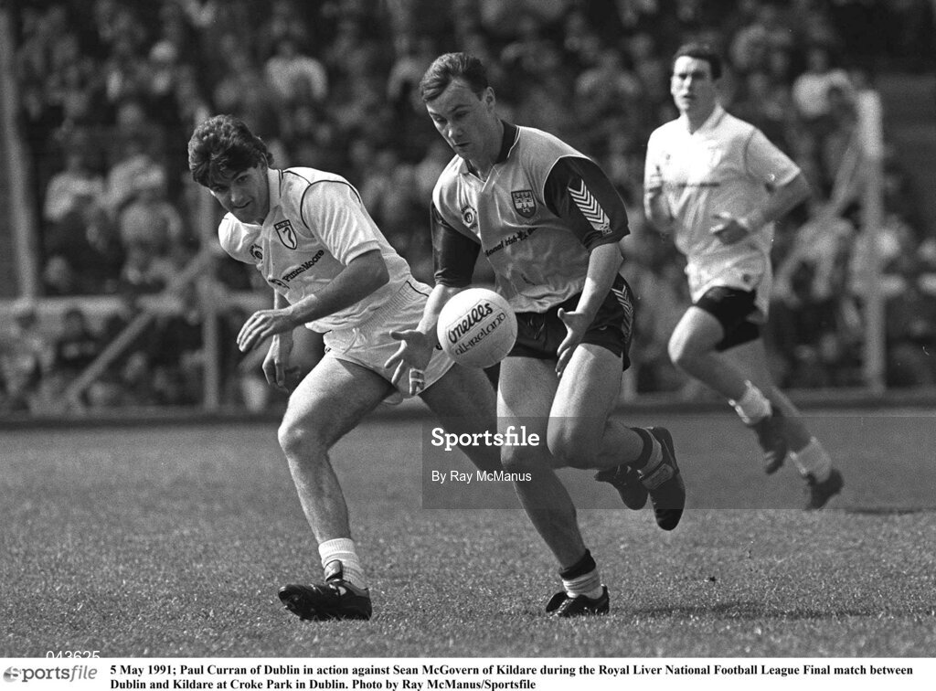 5 May 1991; Paul Curran of Dublin in action against Sean McGovern of Kildare during the Royal Liver National Football League Final match between Dublin and Kildare at Croke Park in Dublin. Photo by Ray McManus/Sportsfile